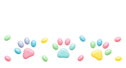 Pastel colored candy paw prints and scattered jelly beans on png isolated transparent background black background