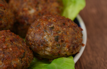 Close-up of baked vegetarian cutlets made with groats, lentils and mushrooms