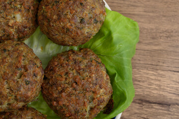 Close-up of round fried minced pork cutlets on a plate