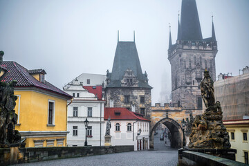 Mysterious Charles Bridge In Prague: An Exciting Sightseen In A Light Mist