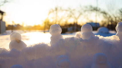duck-shaped figures made of snow, conspiracy games, cold season molded snow figures of ducks and dragons, winter, children's outdoor games