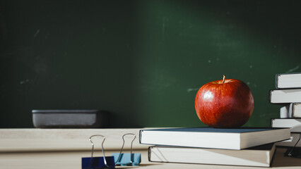 Red Apple on Stack of Books with School Blackboard Background. 3d rendering