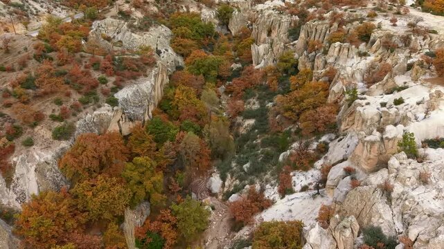 Aerial view of ancient rock formations and vibrant autumn hues in the Phrygian (Frig) Valley in Afyonkarahisar