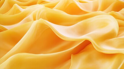 Obraz premium Abstract Yellow Fabric: Flowing, Soft, and Textured with Gentle Curves