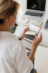 Female Interior designer reviewing fabric and color swatch samples