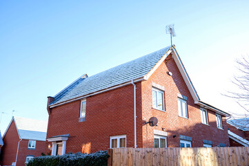 Roof covered with snow. Sunny and cold day.High quality photo