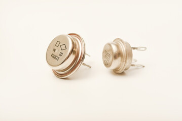 An old bipolar transistor.  A bipolar transistor in a metal case. A powerful transistor.