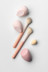 Minimal Makeup Brushes and Sponges in Clean Beauty Flat Lay