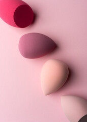 Minimal Abstract Makeup Sponges on Soft Pink Background