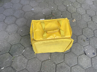 delivery thermsl bag isolated on the sidewalk. top view