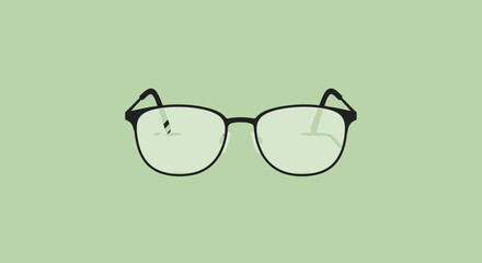 Black framed eyeglasses on a light green background