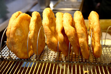 Freshly baked traditional hungarian langos langosch langosh in row for sale