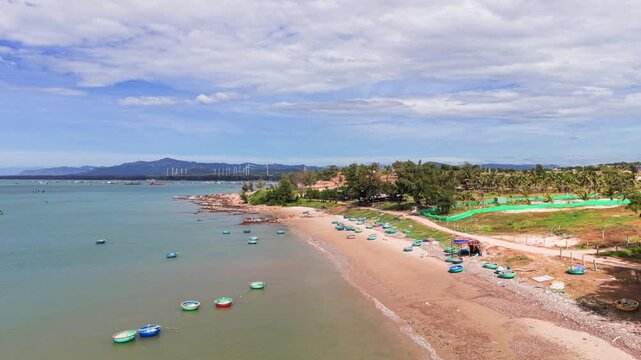 Aerial View Dolly of the Basket Boats at the Beach in Vietnam.