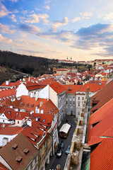 Old Prague street. Aerial view of old town with red roof and blue sky in Prague