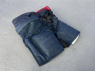 hockey pants on the gray background