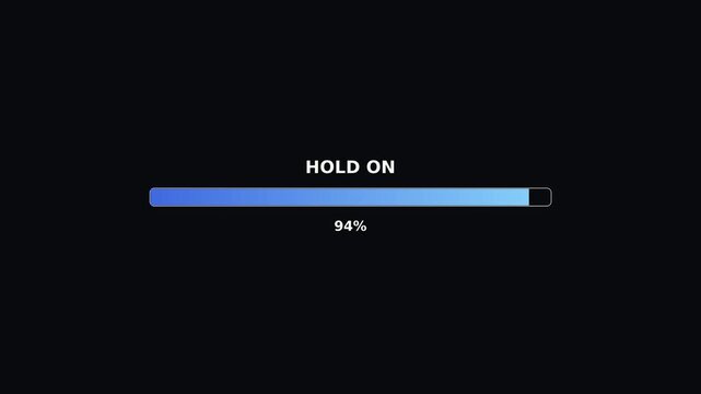 A progress bar animation is displayed on a black background. The text hold on appears above the bar which fills up completely to show 100 percent progress. The visual suggests a completed task.