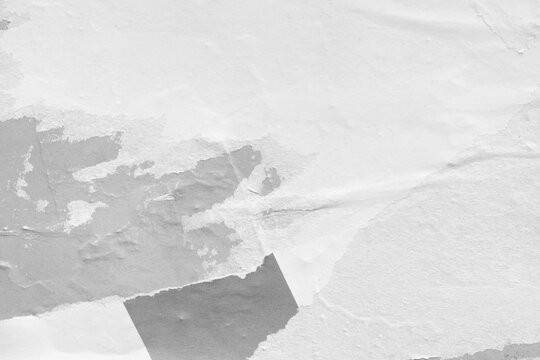 Old ripped torn blank black and white fly posters textures backgrounds grunge creased crumpled paper vintage collage placards empty space for text