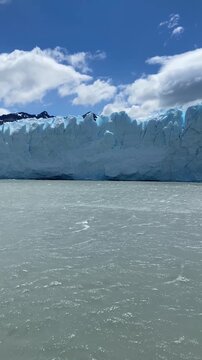 Close view of Perito Moreno Glacier wall from water in Patagonia, Argentina.