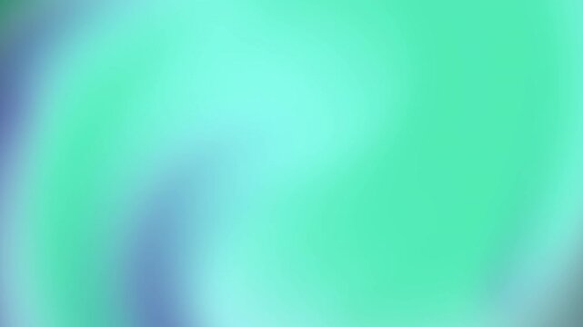 Blurry abstract background with green and blue hues.