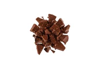 A macro shot of rich dark milk chocolate exploding into shards and powder on a white background with copy space. Concept for confectionery advertising