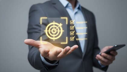 Businessman presenting digital interface with target and data on screen in hand
