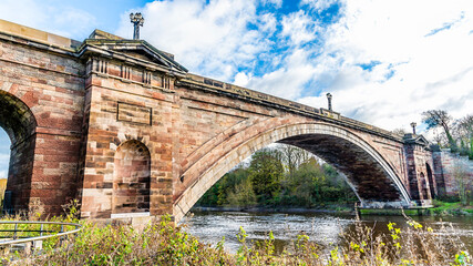 A panorama view of the Grosvenor Bridge up the River Dee in the city of Chester, Cheshire, UK