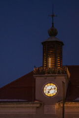 Historic tower of the cityhall clock and with christmasdecoration in the small town Stainz in Styria, Austria in the early morning hours