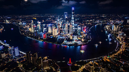 Illuminated Shanghai Lujiazui Skyline at Night with River Reflection © TranThi