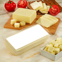 Vacuum Packed Cheese Mockup with Sliced Cheese and Tomatoes on Board