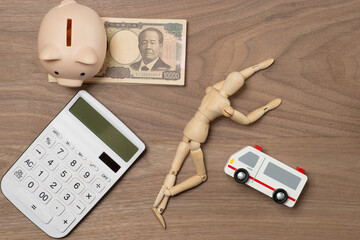 倒れた人と救急車と聴診器