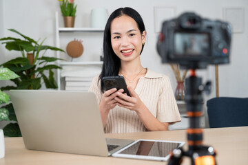 Content Creator at Work: A vibrant young content creator, poised and engaging, expertly utilizes modern tech to craft her work, embodying the essence of modern digital media and communication.