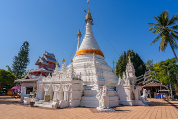Beautiful white pagoda inside Wat Phra That Doi Kong Mu, an important temple in Mae Hong Son Province, Thailand.