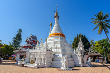 Beautiful white pagoda inside Wat Phra That Doi Kong Mu, an important temple in Mae Hong Son Province, Thailand.
