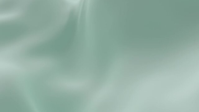 Soft mint green silk fabric gently rippling smooth waves creating elegant minimal background texture symbolizing freshness calm relaxation and luxury aesthetic ideal for design, video, or decor themes