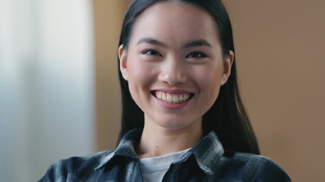 Close-up Asian woman smiling looking at camera friendly sincere expression perfect skin natural makeup portrait Korean Japanese Chinese girl 20s female student model girlfriend wife toothy happy smile