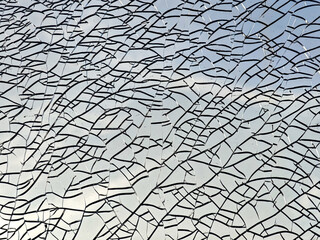 Full frame broken glass crack texture background