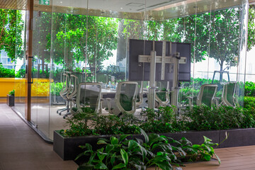 The backdrop of the evening sky along the river, with riverside houses and communities, or tall...