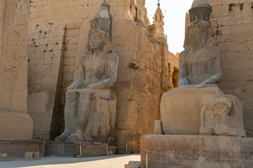 Ancient statues stand at Luxor Temple showing history of Egyptian civilization and culture