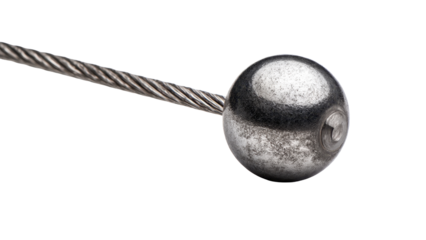Metal ball hanging from a wire cable
