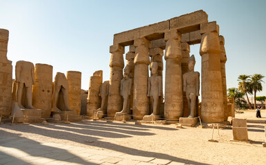 Visit to ancient Luxor Temple ruins in Egypt during midday sunlight