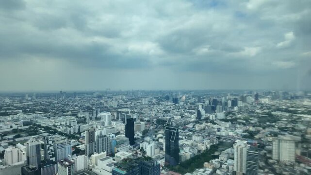 Camera footage of modern city skyline on clear day	
