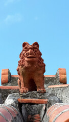 瓦の上のシーサー
