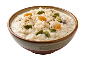 creamy yogurt bowl with pistachio nuts and seeds on ceramic dish