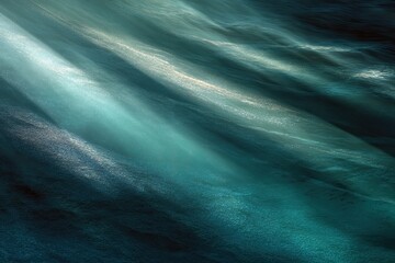 Abstract image of flowing, turquoise and teal fluid, resembling ethereal light rays through space