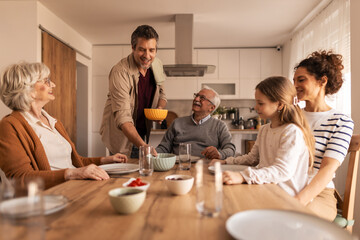 Family enjoying lunch together at home