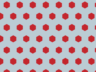 This image displays a repeating geometric pattern consisting of small, solid red hexagons. The shapes are arranged in staggered rows across a uniform, pale blue background. The consistent spacing 