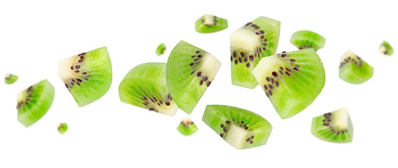 Peeled triangular kiwi slices fly and levitate in space. Isolated on white.
