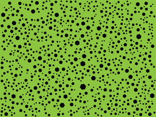 This image features a vibrant lime green background covered entirely by a dense, random pattern of black dots. The dots vary considerably in size, ranging from tiny specks to larger, slightly 
