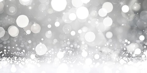Obraz premium A dreamy abstract image with bright, soft bokeh circles on a gradient white and silver background