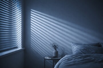 Minimal bedroom interior with window blinds and striped light shadows on wall at night
